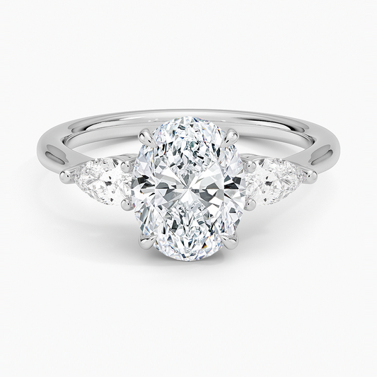 Oval and Pear Diamond Trilogy Ring